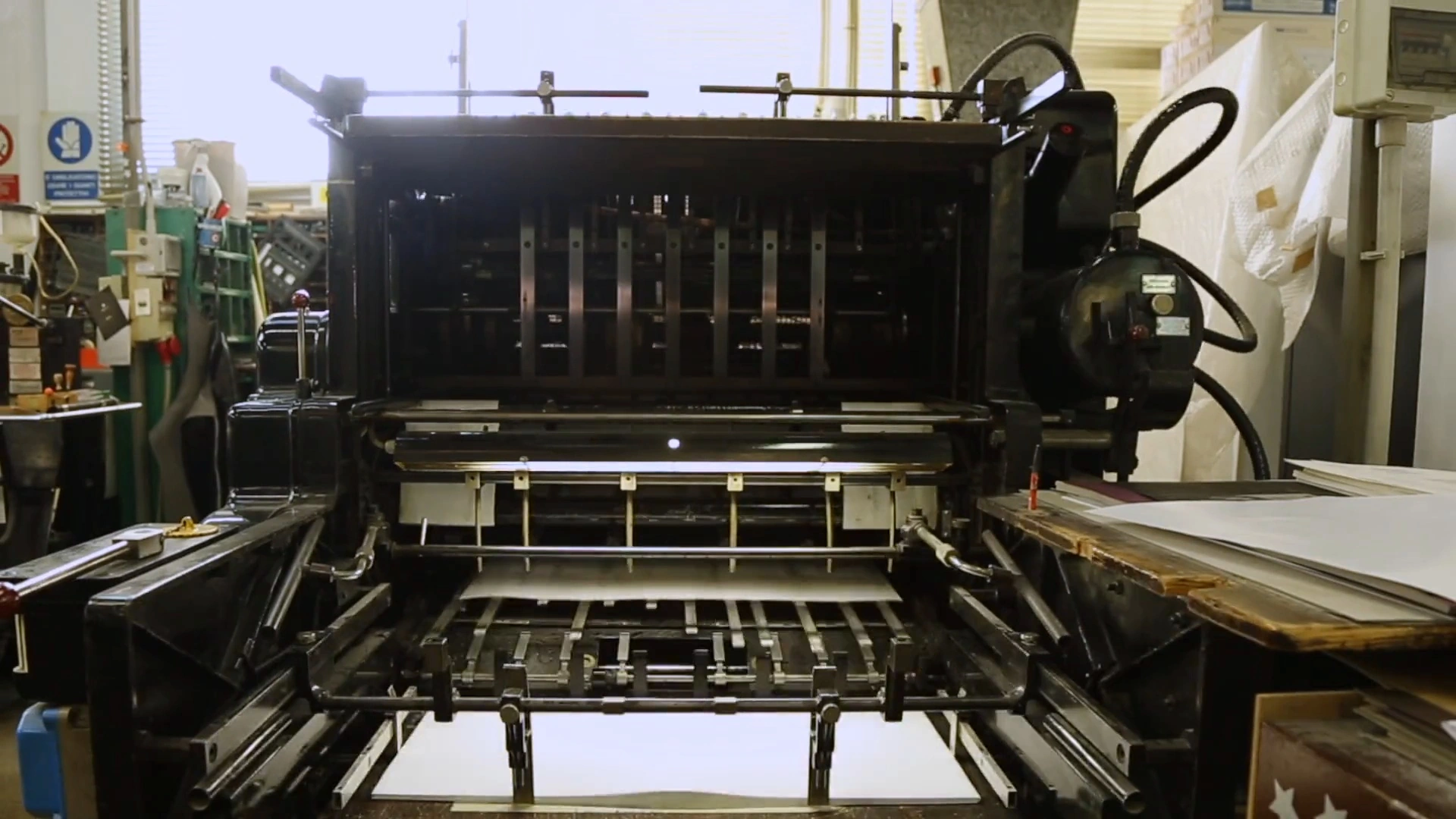 Printing press and sheets of paper
