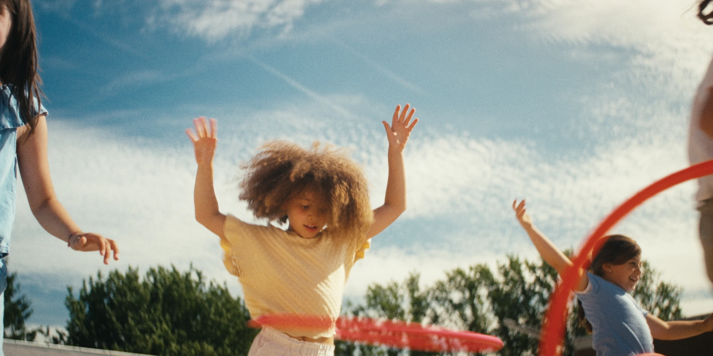 Children playing with hoops