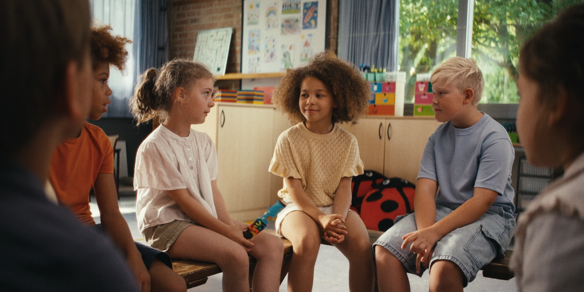 Children gathered in a classroom circle