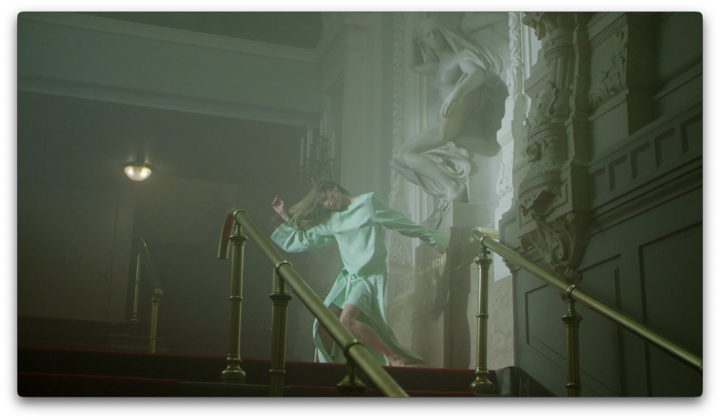 Gioia Seghers — Mint green dancer beside the staircase sculpture