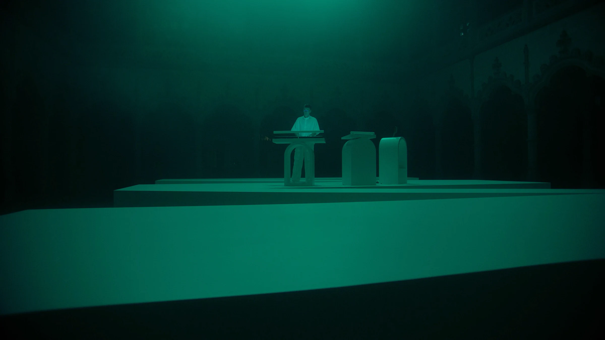 Wide stage in teal light