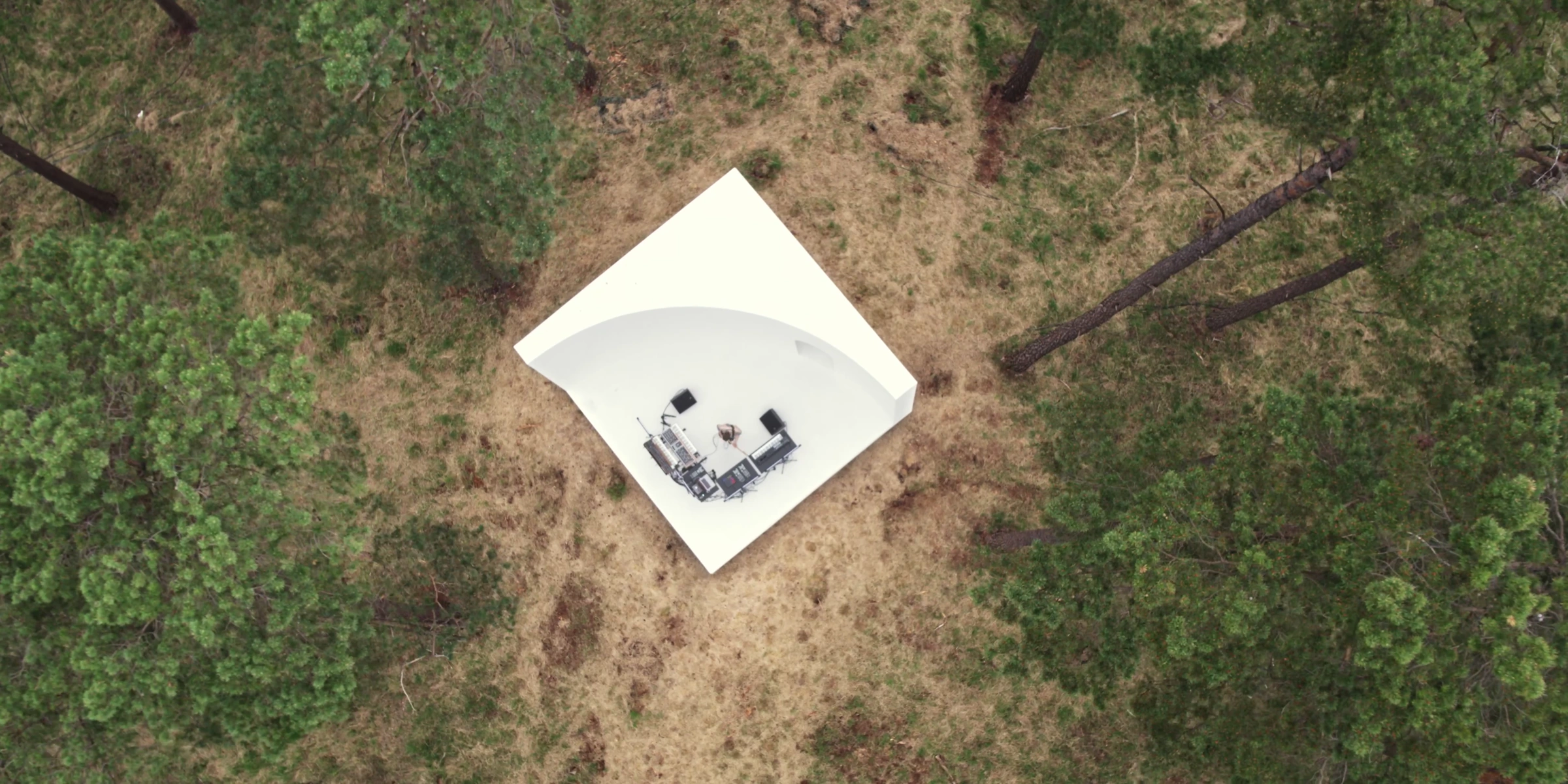 Overhead view of the stage among the trees