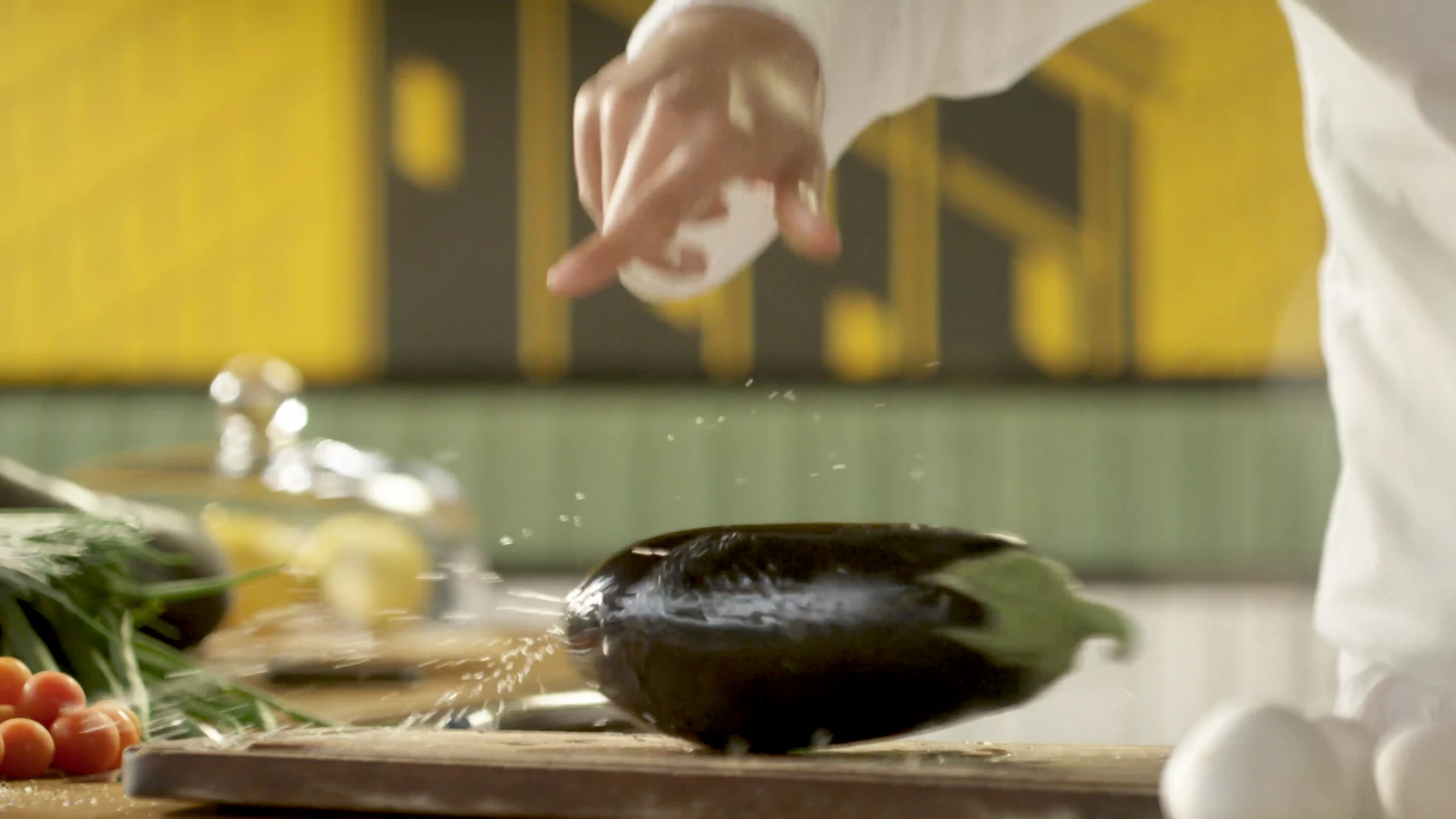 Preparing an aubergine in the kitchen