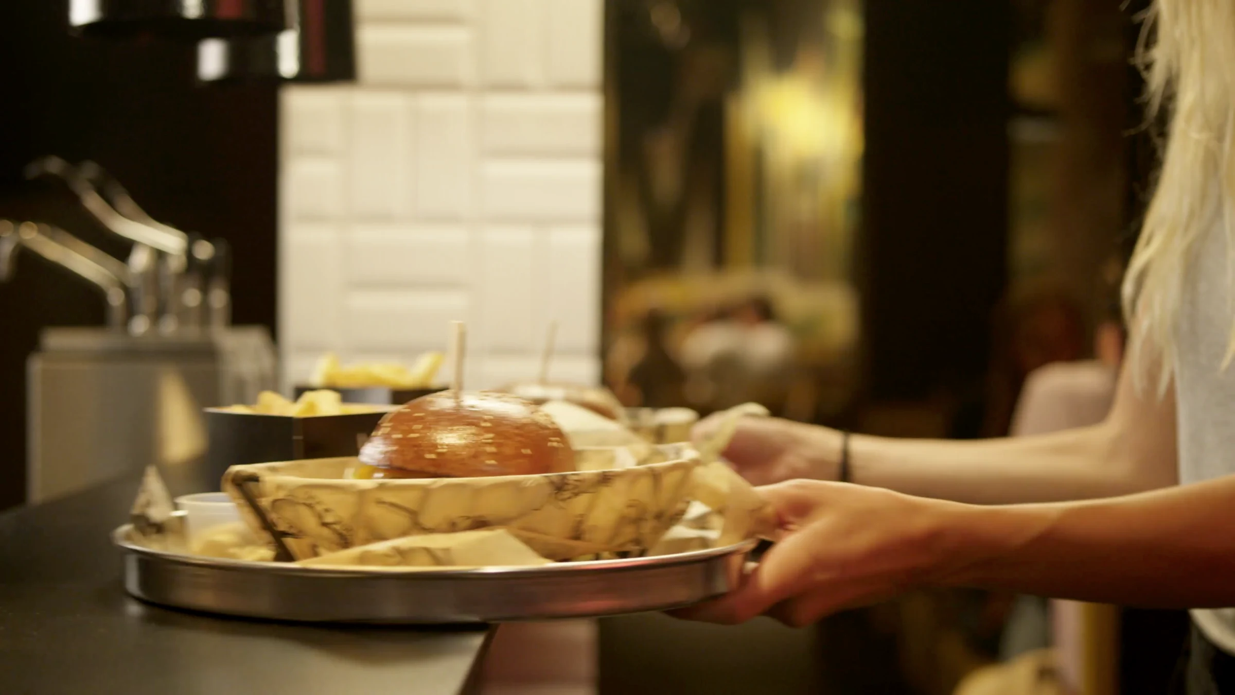 Serving burgers at the counter