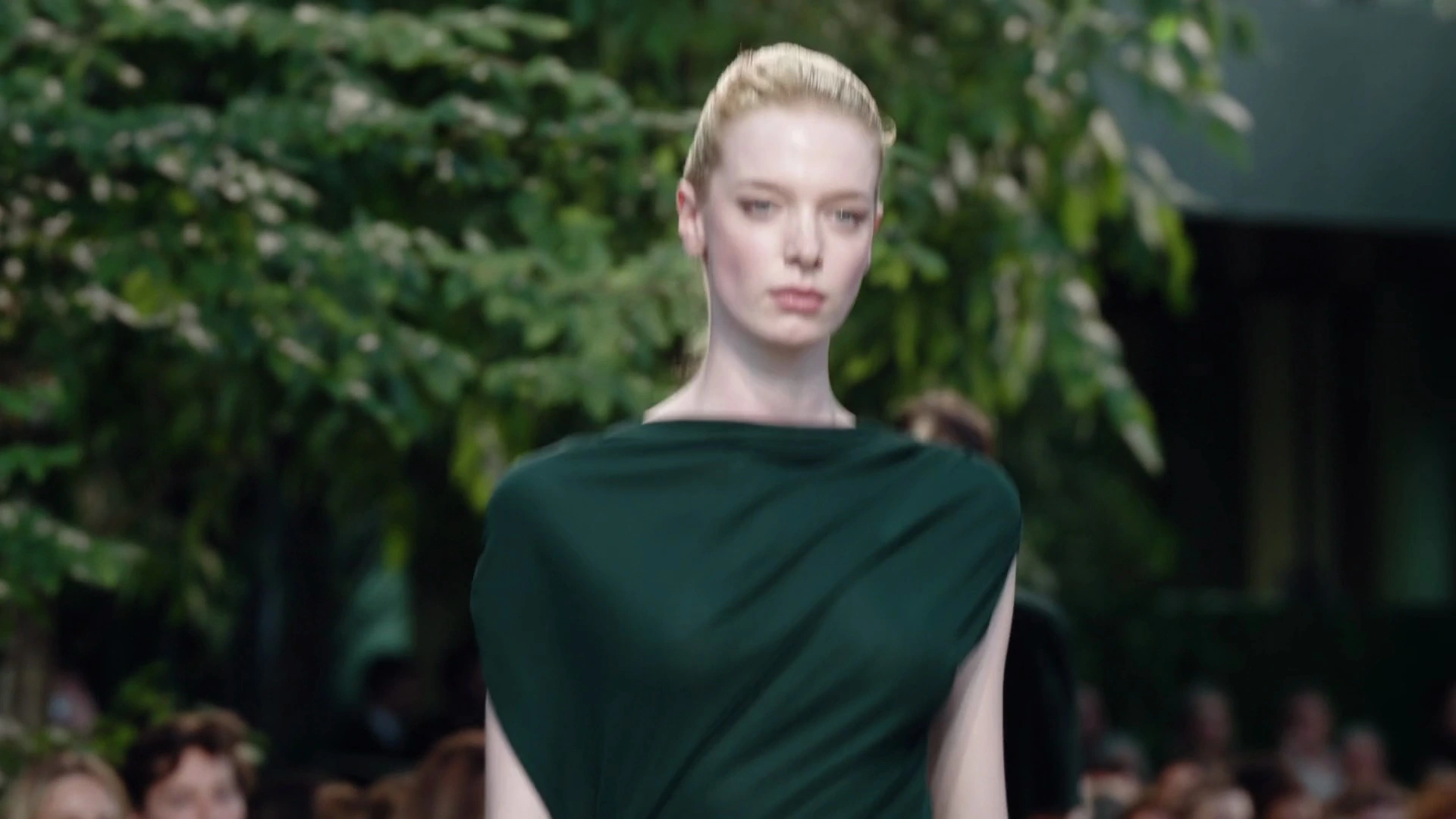 Forest-green draped silhouette