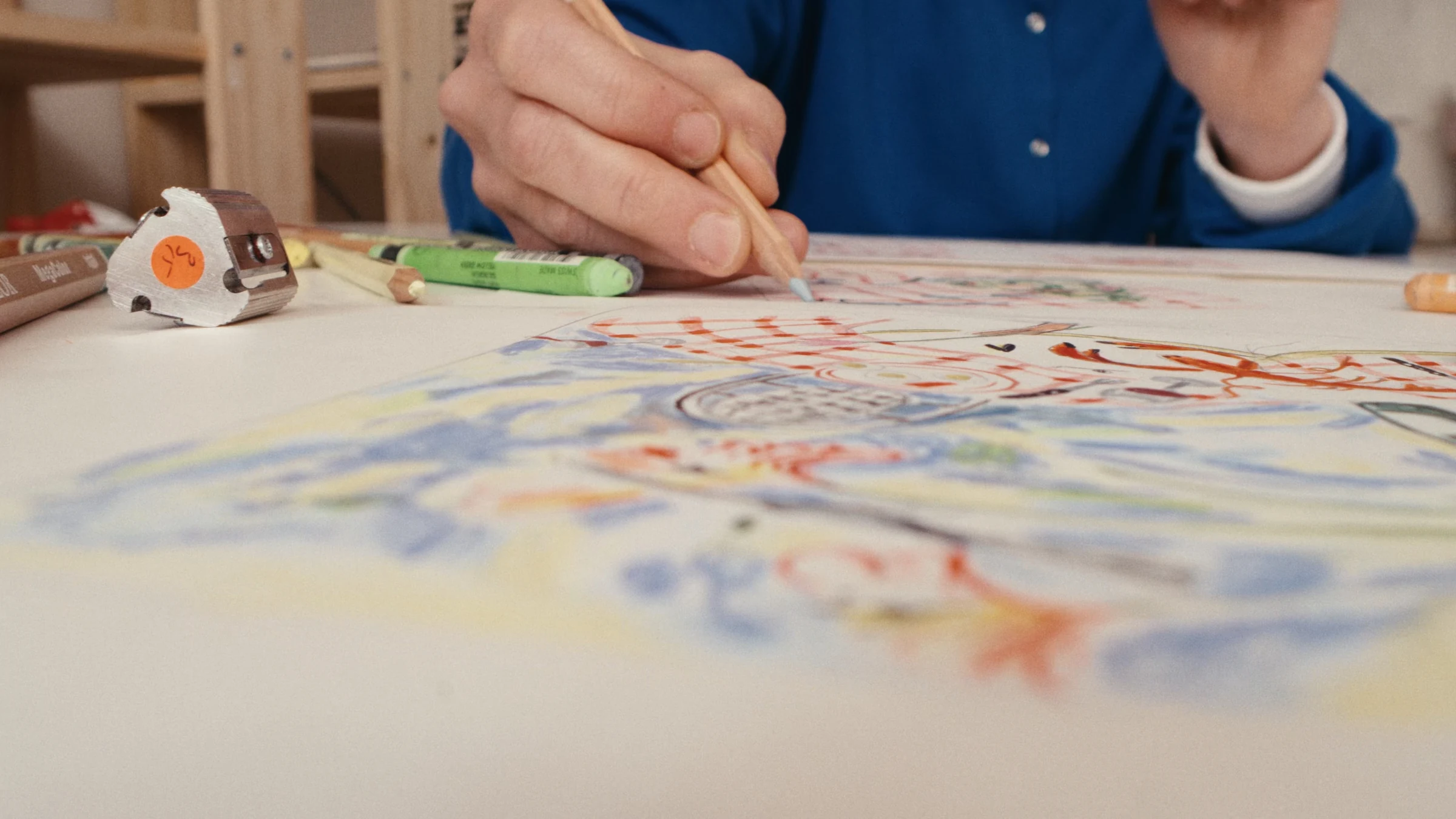 Philippine drawing at her worktable