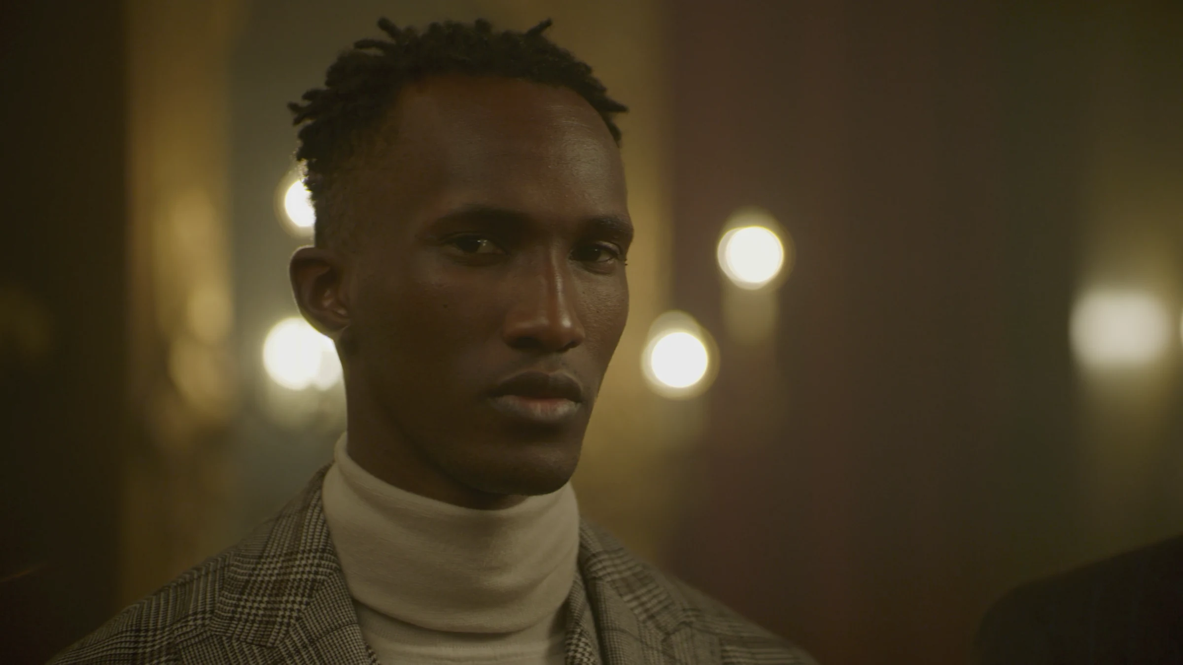 Close portrait in Scabal tailoring