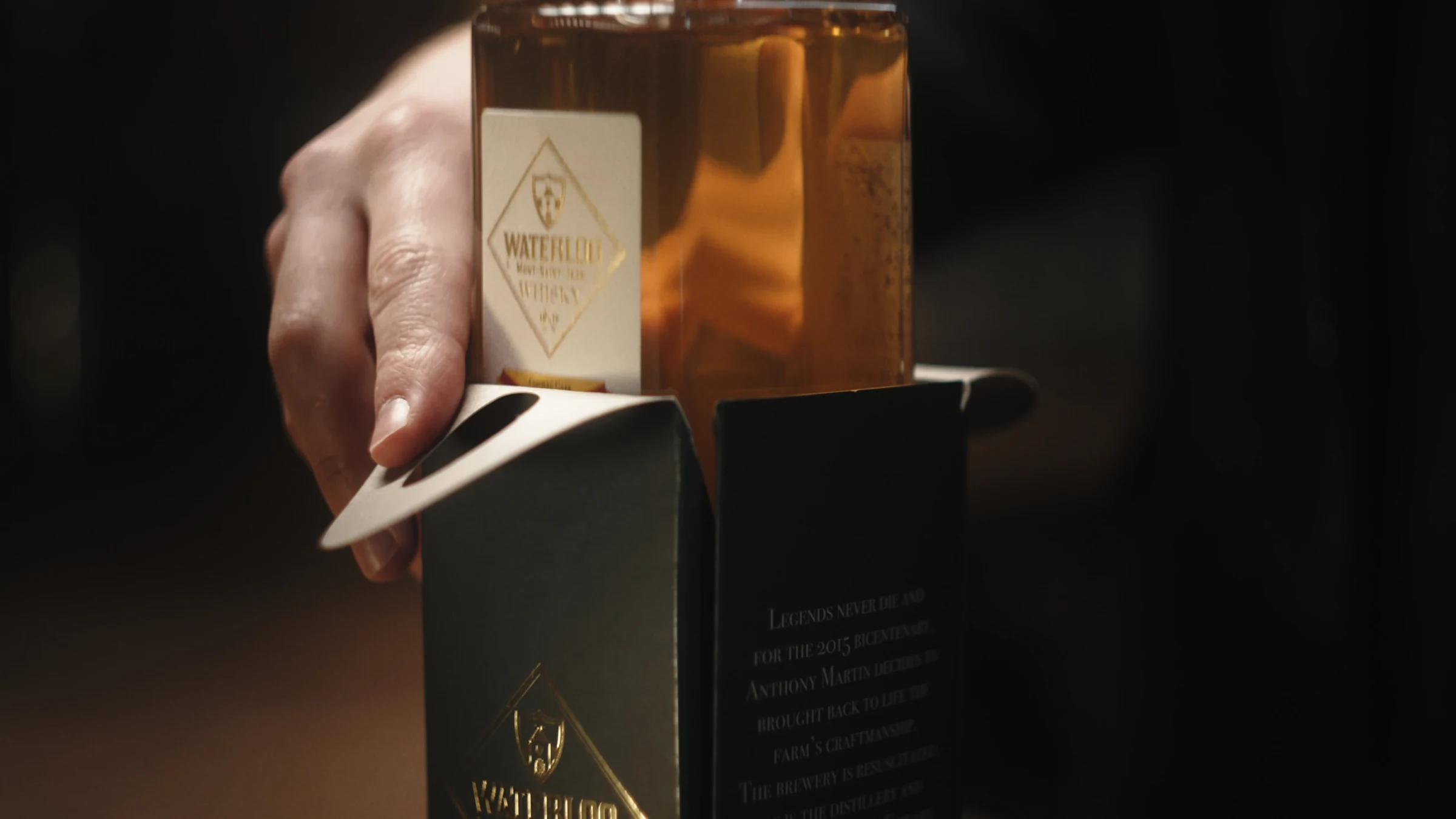 Lifting the Empereur bottle from its packaging
